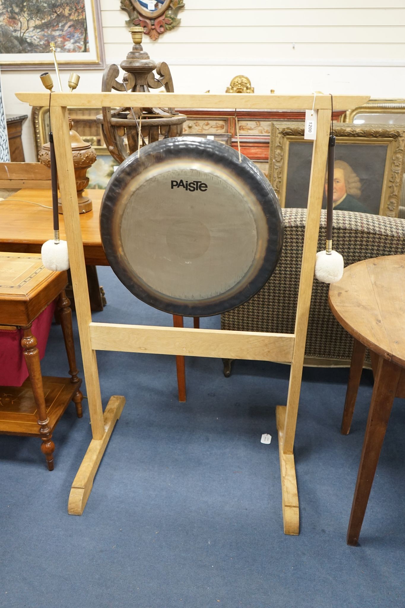 A Paiste 56cm. gong and a pair of Paiste M3 mallets, on purpose-made oak stand, stand height 124cm